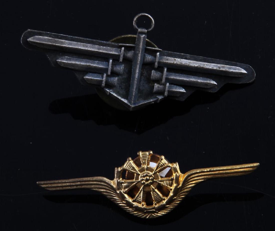 LOT OF 2 POLISH NAVAL OFFICERS' SCREWBACK CLASPS: Pair of Naval Officer's Screwback Clasps one in silver color alloy with central anchor and the other in a gold color alloy with a central captains wheel screwback on obverse is marked "Mennica Panstwo