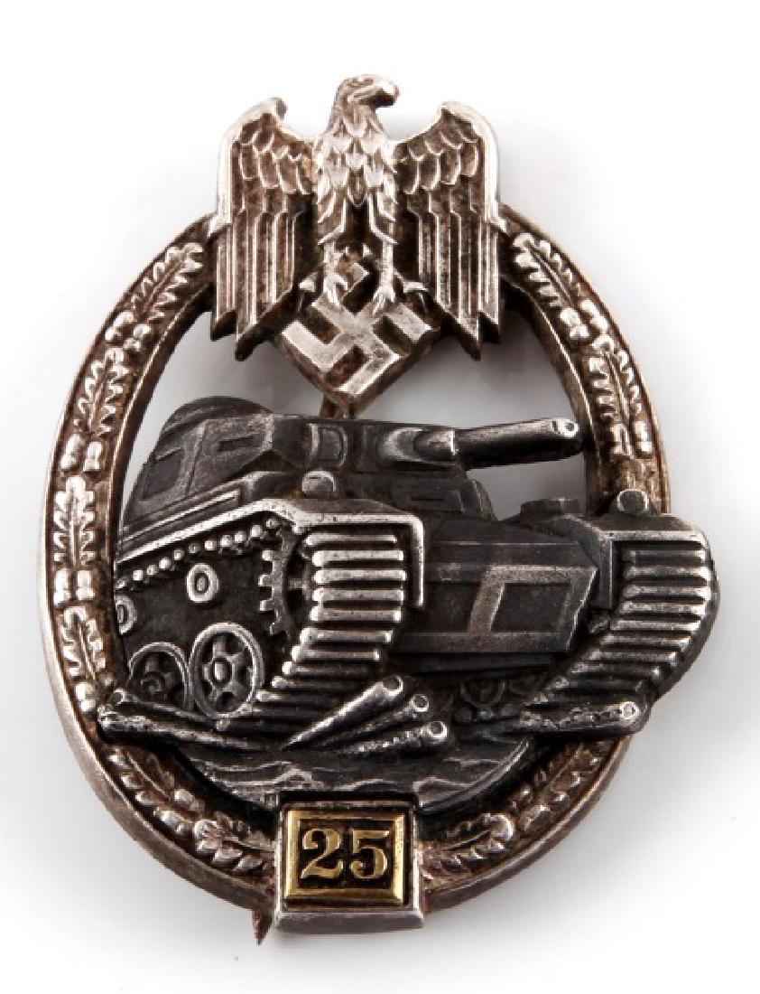 WWII GERMAN 25 PANZER ASSAULT BADGE IN SILVER: German WWII 25 Panzer Assaults badge in silver. Verticle pin up the back of the pin, with the hook clasp slightly bent. Expected tarnish with age.