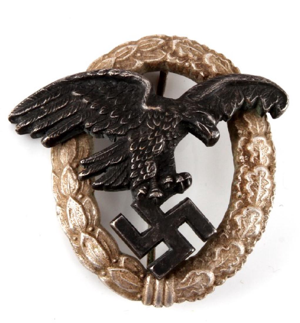 WWII GERMAN THIRD REICH LUFTWAFFE OBSERVER BADGE: Luftwaffe Observer's Badge issued to non-pilot members of air crews. Marked GH Osang Dresden. In very good condition with some tarnishing.