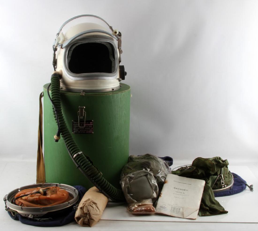 RUSSIAN SPACE PROGRAM COSMONAUT HELMET: Tags marked 05/89, cosmonaut GSH-6, in its original box with complete flight helmet gear, comes with retractable inner sun visor and locking ring worn at pilot neck with latex dam. Included inner helm