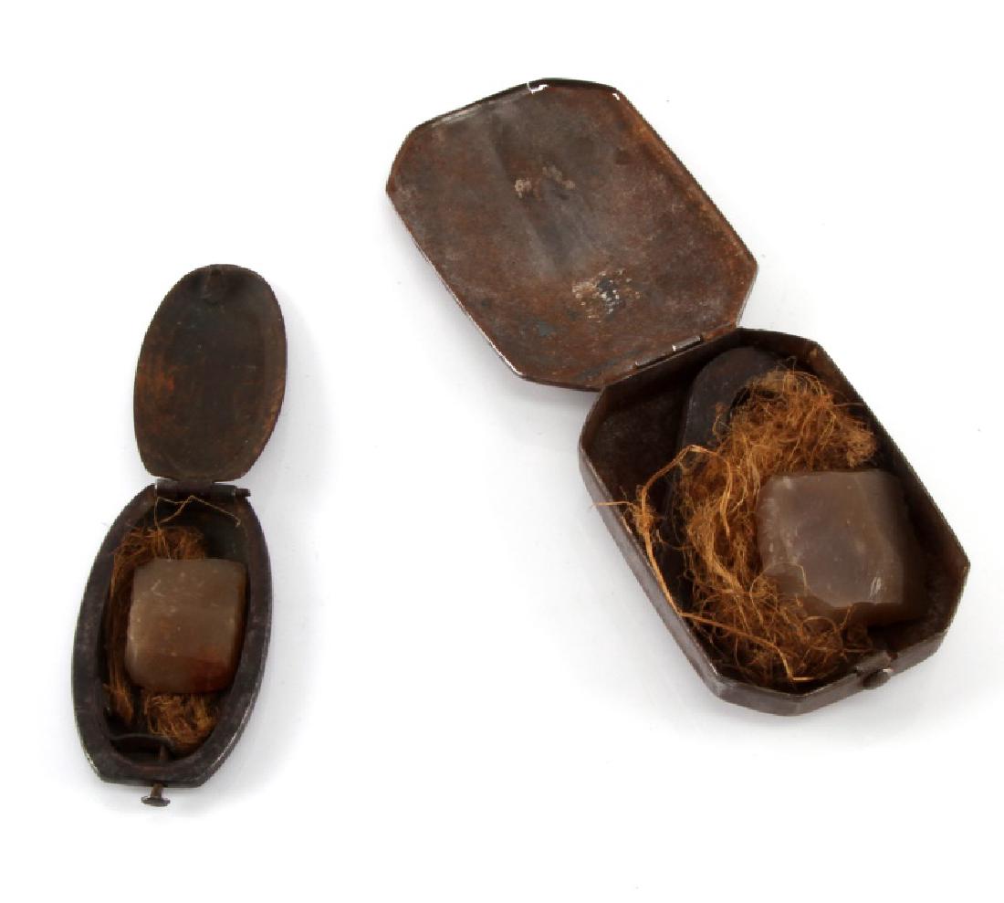 2 RARE ANTIQUE TINDER BOX TIN LOT: Lot of two (2) tin boxes includes one large and one small box. Larger box (3") contains flint stone, a steel, and tinder. Smaller box (2 3/8") contains flint stone and tinder. Age wear and rust presen