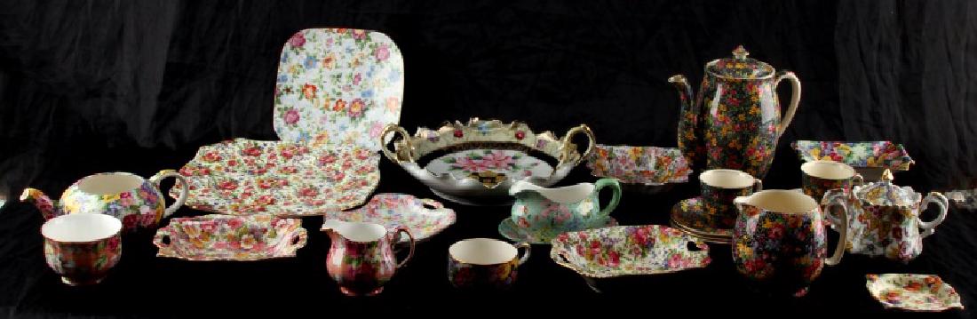 MIXED LOT OF PORCELAIN ROYAL WINTON SHELLEY NIPPON: Mixed lot of porcelain, 24 pieces. Includes: Royal Winton Cromer coffee pot, 4 saucers, and 2 demitasse cups, Hazel creamer, Nippon china bowl, and assorted cups and dishes: Summertime, Marion, Julia,