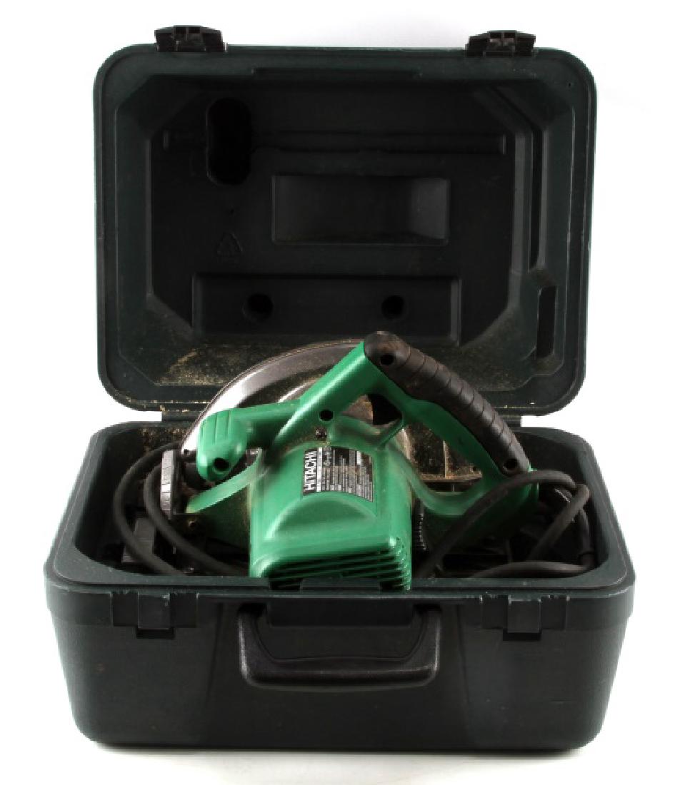 HITACHI C7SB2 CIRCULAR SAW WITH HARD CASE: Light show of use present. Tested and in working condition; overall in very good condition.