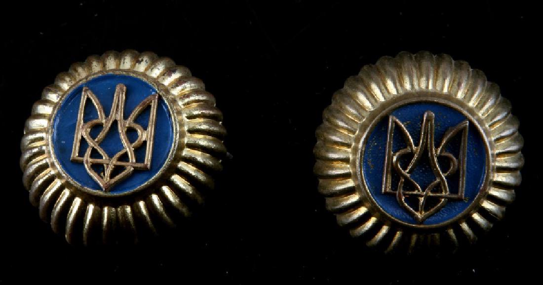 PAIR OF POST WWII ERA UKRANIAN CAP BADGES: Pair of Post WWII Era Ukrainian Cap Badges, both are in excellent condition despite expected aging. Overall good condition.
