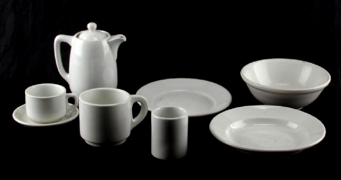 WWII GERMAN 3RD REICH MILITARY MESS HALL DISH LOT: Lot of 8 includes plate, bowl, large bowl, soup cup, water cup, coffee cup and saucer with small pitcher with chip on rim guard. Various years and German Third Reich military marks.