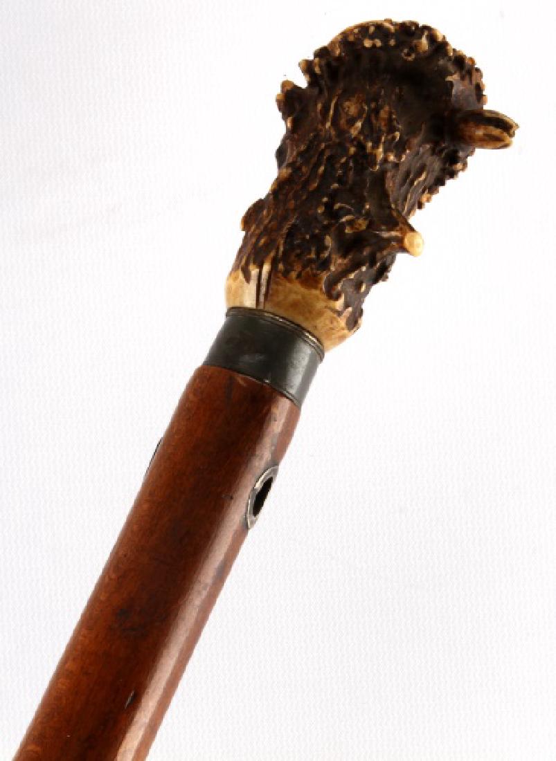 ANTIQUE MONOGRAMMED SWORD CANE WALKING STICK: Monogrammed sword cane with an antler handle. In very good condition overall. Measures 37 inches in overall length, with the sword measuring 35 inches long, and the blade measuring 27 1/2 inches. Blad