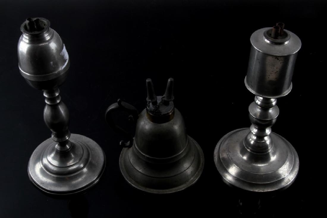 3 ANTIQUE PEWTER WHALE OIL LAMP LOT R DUNCAN ETC: Lot of three (3) includes: 1) one 7 3/4" American pewter whale oil lamp (circa 1820-1830) signed/stamped "R. Duncan", a well-known pewter smith, 2) one 8 3/8" American pewter whale oil lamp (circa 183