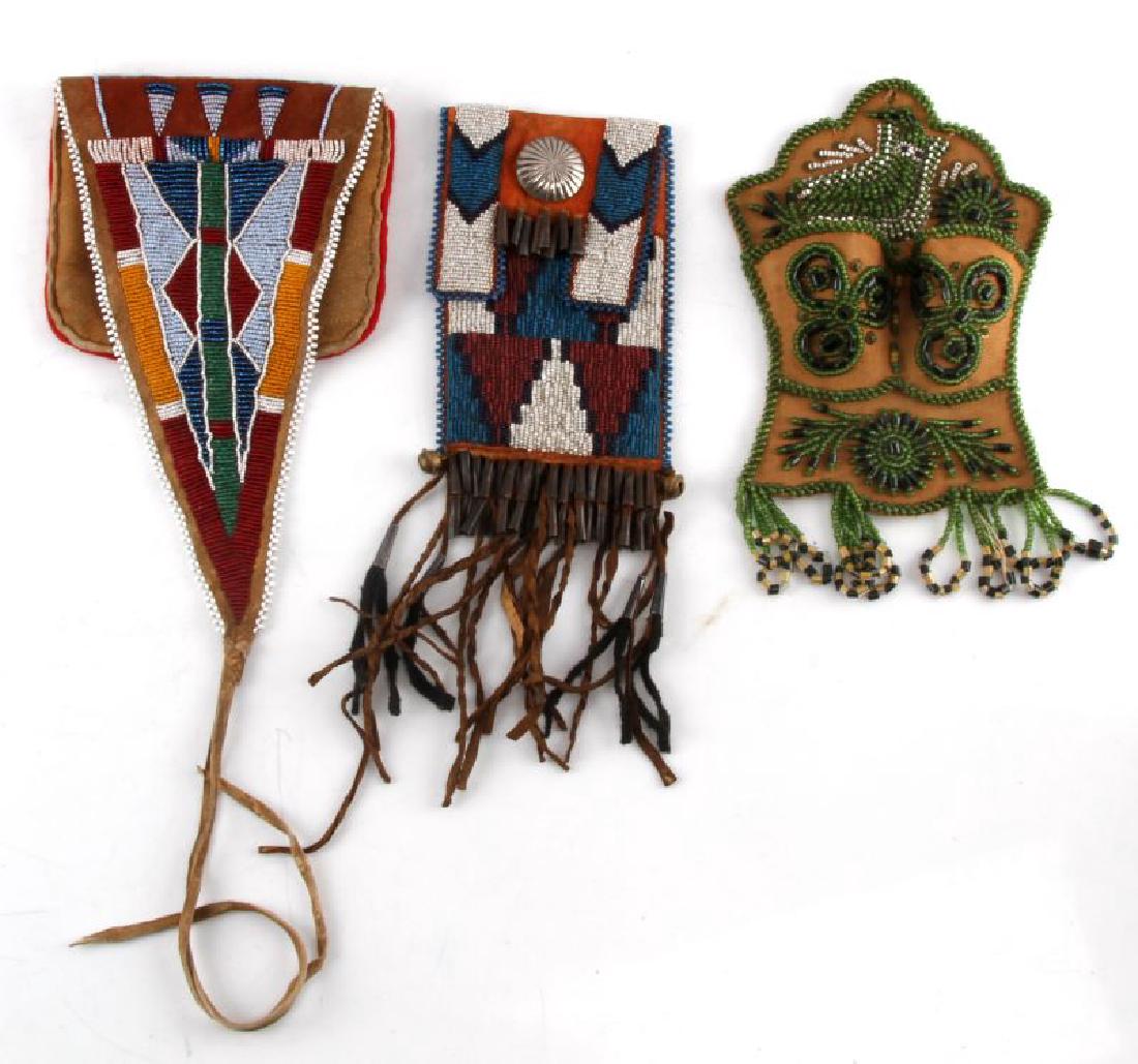 ANTIQUE NATIVE AMERICAN BEADED LEATHER BAG LOT: Lot of 3 includes antiques hand beaded leather medicine-tobacco style bags all in very good condition showing some minor wear with beadwork in very good condition.