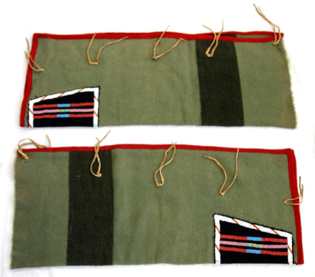 19TH CENTURY TRADE WOOL MADE NATIVE AMERICAN CHAPS: Late 1880's trade wool made Plains Indian hand beaded chaps. They are in good condition with some minor loss of fabric, they have been mended in a few spots over the years. They measure 32 inches in l