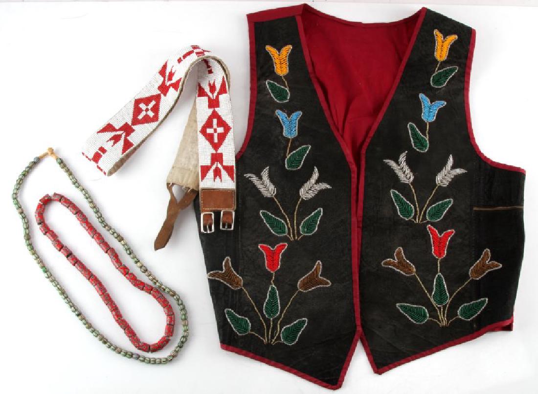 AMERICAN PLAINS INDIAN CLOTHING ACCESSORIES LOT: Lot includes Leather and cotton vest with floral bead pattern in very good condition along with beaded belt and 2 strings of Venetian Trade Beads.