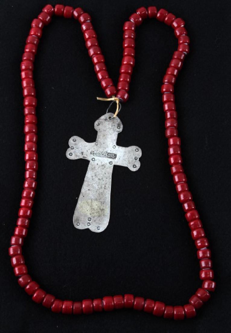NATIVE AMERICAN ANTIQUE FUR TRADE ERA SILVER CROSS: Silver latin cross from the fur trade with Native Americans. It has a maker's mark which reads Machon, 4 inches in length, with a red Venetian glass bead necklace, original to the same time period, th