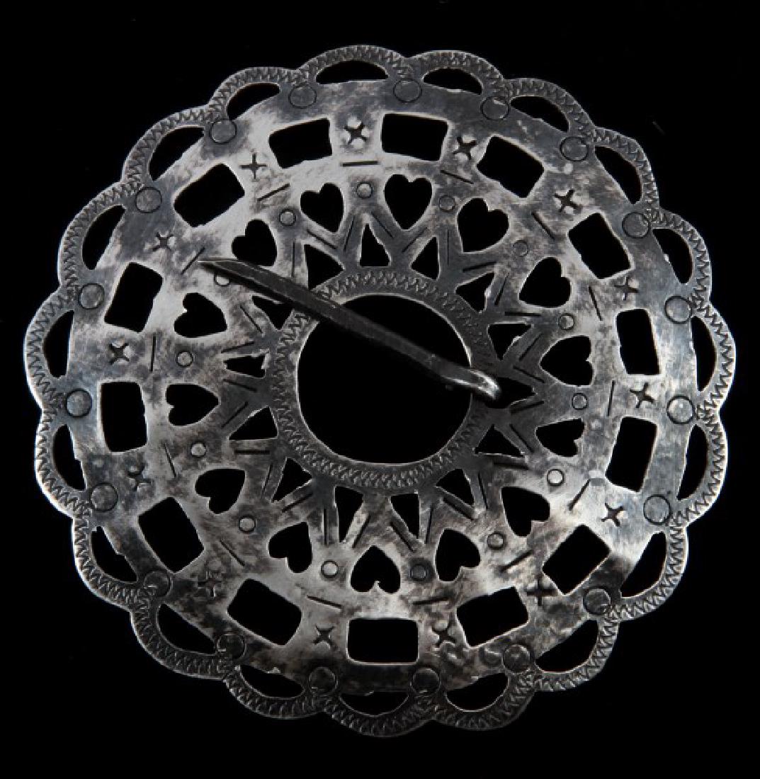 ANTIQUE NATIVE AMERICAN FUR TRADE SILVER BROOCH: Silver brooch from Native American fur trade era with no maker's marks or hallmarks apparent. Includes silver pin for attaching. Measures 6 inches in diameter. In very good condition with some tarnish