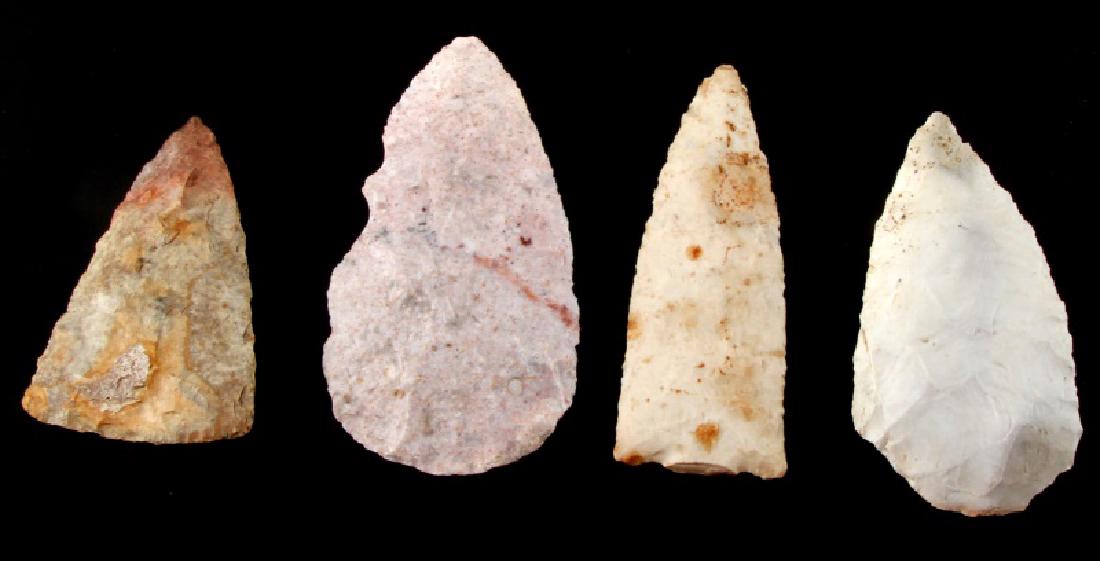 ARCHAIC AND LATER ARROWHEAD BLADE POINT LOT OF 4: 4 blade/points. Includes: 3 1/8 inch Fort Payne blade from Snyders, TN with broad flaking and pink color at top, 3 7/8 inch Dovetail from Missouri with a snapped base and horizontal flaking, 3.75 inch