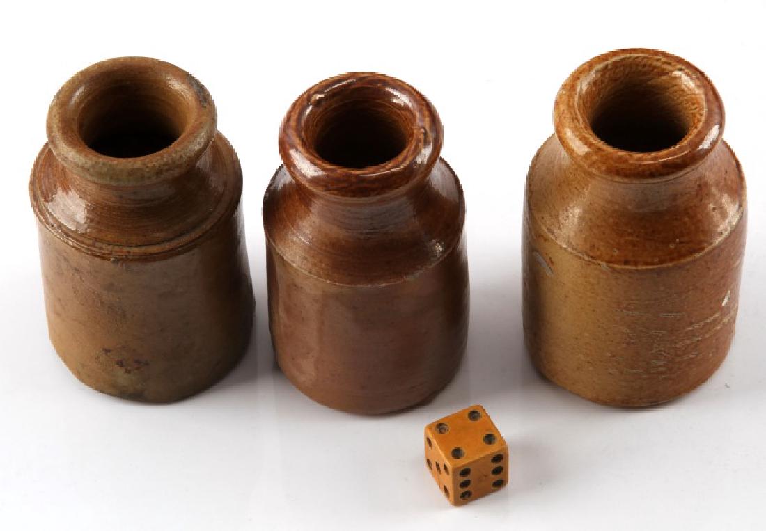 ANTIQUE HANDMADE CERAMIC JAR AND WOODEN DICE LOT: 3 ceramic jars and 1 wooden 6 sided die. Each jar measures about 2 1/2 inches tall, and are all in good condition, with one having a slight chip on one side. The die is about one half inch cube and in
