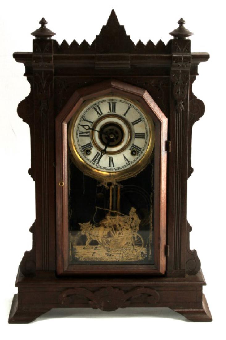 ANTIQUE OAK INGRAHAM WINDING MANTLE CLOCK: Antique mantle clock from The E. Ingraham and Co., the name under which famed American clock maker Elias Ingraham worked from 1881 to 1885. Movement is in very good condition and keeps time well, key