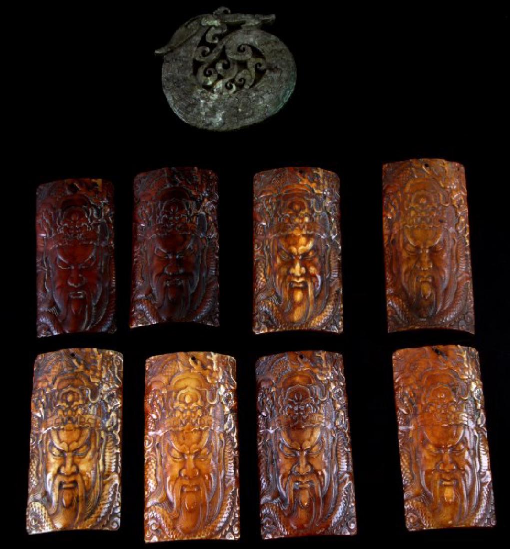 9 PIECE LOT OF CARVED STONE ASIAN THEME PENDANTS: All are in very good condition. 8 are the same size and image size being 3 1/2 inches by 2 inches. The difference in them is their color, They range in color from light brown almost ivory color to a d
