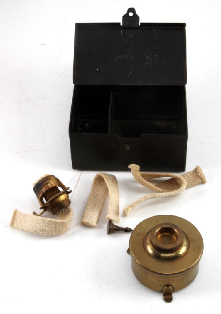 AMERICAN CIVIL WAR ERA PORTABLE WAX SEALING KIT: Steel box containing a small brass lamp, 4 wicks, and 1 seal reading "Robert". No wax or handles for seal, but all pieces present are in very good condition and ready for use. Box is somewhat worn, bu