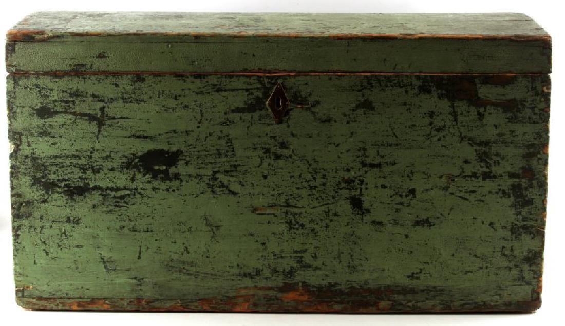 ANTIQUE WOODEN NAVAL SEA CHEST WITH BECKET HANDLES: Wooden sea chest with a rounded top and handle on each side. Handles are made of stiff rope, and the mounts on the box display a five-pointed star. The star on the left of the box is missing one of it