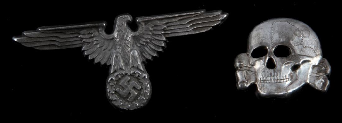 WWII GERMAN SS VISOR PIN EAGLE & TOTENKOPF: 2 pins both RZM marked and Totenkopf is marked M1/24. Unauthenticated sold as is. This lot has a reserve.