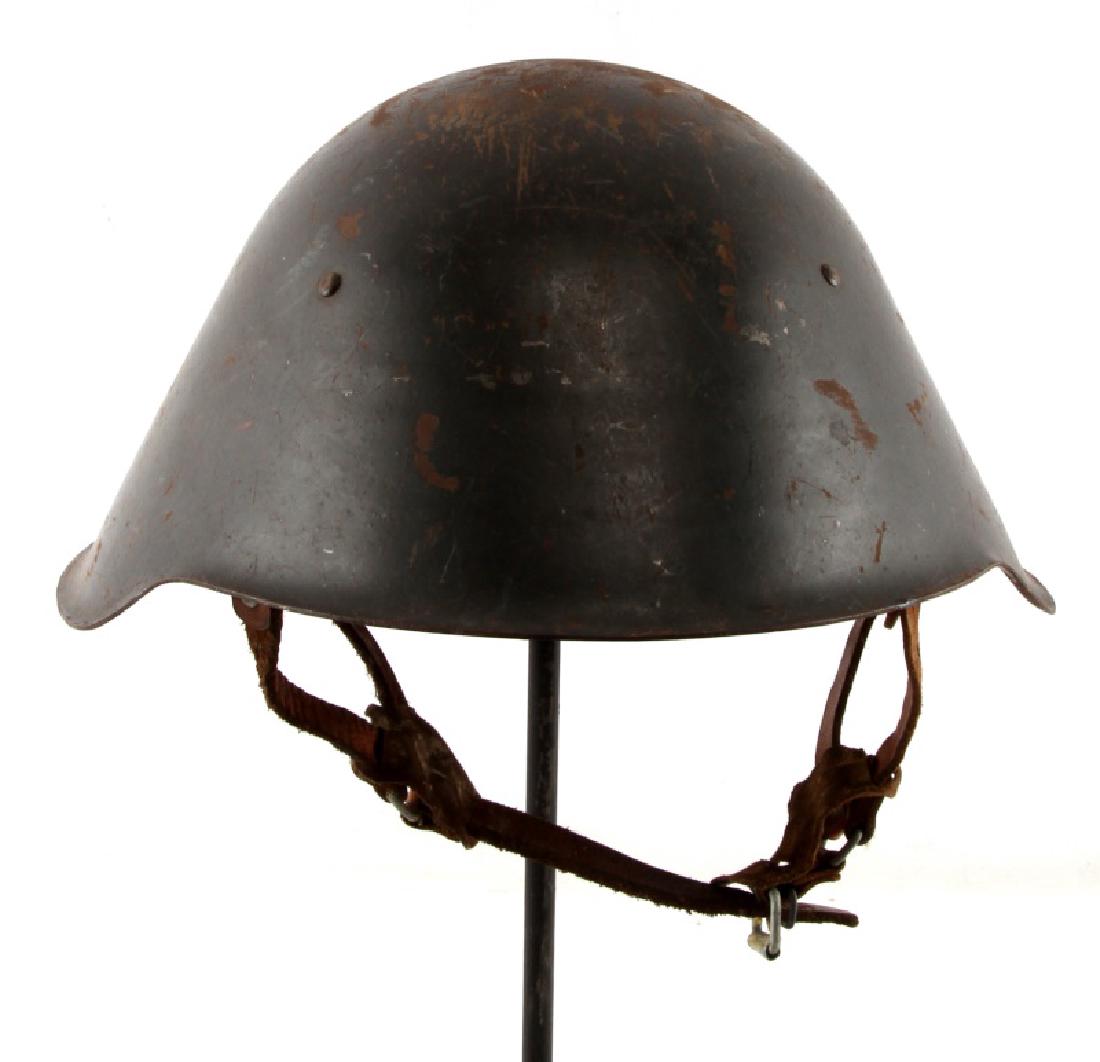 POST WAR EAST GERMAN NVA STEEL HELMET W LINER: These helmets were used during the soviet occupation of East Germany. Has finish loss and definite wear. Markings to left inside "II 12 62". Overall good condition. HG NOL