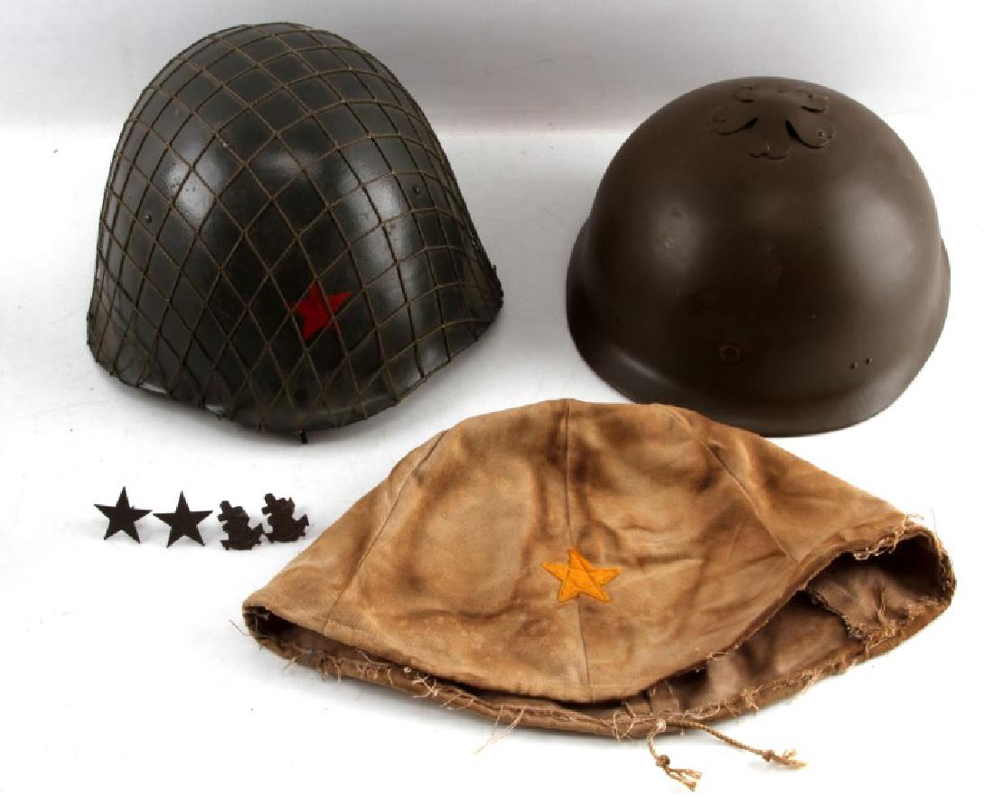 JAPANESE M 1922 & SOVIET WWII IJA COVER HELMET LOT: Original Soviet helmet with chinstrap liner and netting, reproduction model 1922 Cherry Blossom top helmet, complete, original WWII Japanese helmet cover, and Japanese Naval Marines and IJA helmet sta