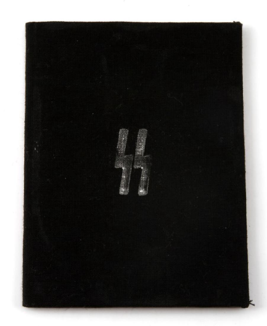 GERMAN WWII THIRD REICH SS TOTENKOPF AUSWEIS: ID card of an SS soldier serving in the Waffen SS Panzer Division Totenkopf. Printed signature of Heinrich Himmler present. Some wear present; overall in very good condition. Unauthenticated, sold as 