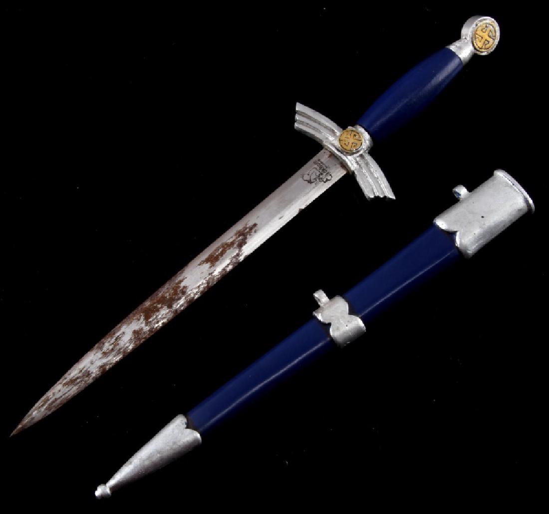 GERMAN WWII THIRD REICH LUFTWAFFE MINI SWORD: Includes scabbard. Marked "Eickhorn" and has squirrel maker's marking. Some wear and discoloring present. Overall in very good condition. Unauthenticated, sold as is. This lot has a reserve.