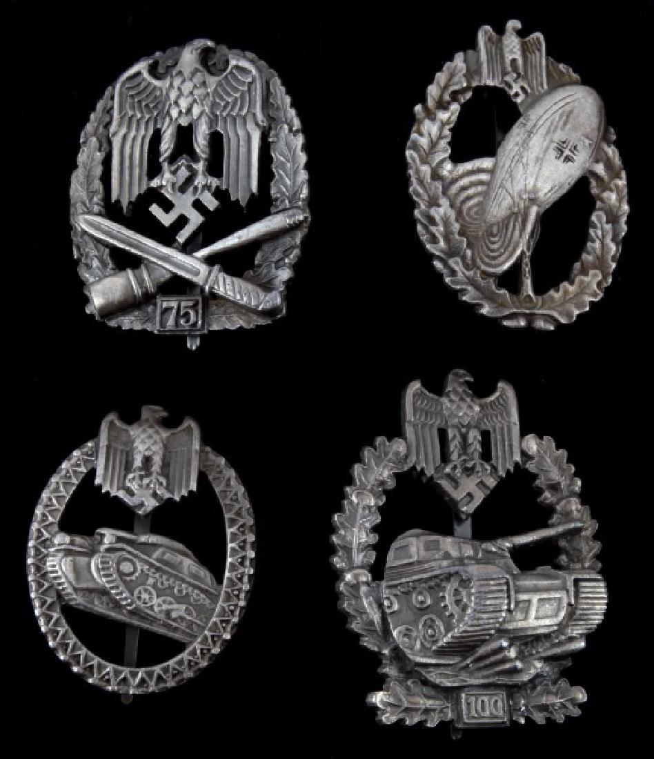 4 GERMAN WWII THIRD REICH HEER BADGES: Includes General Assault (75 actions), Tank Assault (100 actions), Panzer Honor, and Balloon Pilot. Some wear and discoloring present. Overall in very good condition. Unauthenticated, sold as is. This