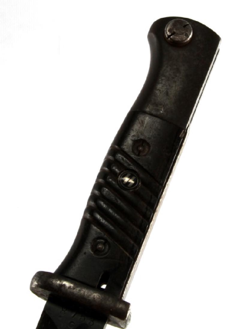 WWII GERMAN THIRD REICH WAFFEN SS K98 BAYONET: K-98 Mauser bayonet with scabbard and leather frog. Measures 15 15/16 inches long overall. The steel blade is maker marked 'S/176 G 8753 C'. It measures 15/16 inches wide by 9 3/4 inches long. Scabbar
