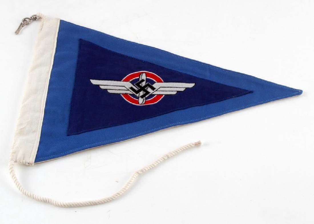 WWII GERMAN 3RD REICH NSFK GLIDER KORP CAR PENNANT: Measures 13 7/8 inches wide by 9 3/4 inches tall. Has a white cotton bunting on one end. Multi piece machine embroidered cotton construction. Unauthenticated sold as is.