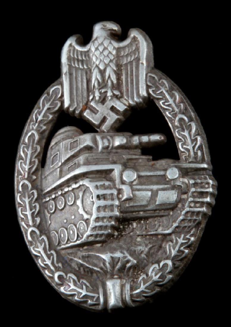 WWII GERMAN TR PANZER SILVER ASSAULT BADGE: Has a thin vertical pinback. Stamped nickel construction.