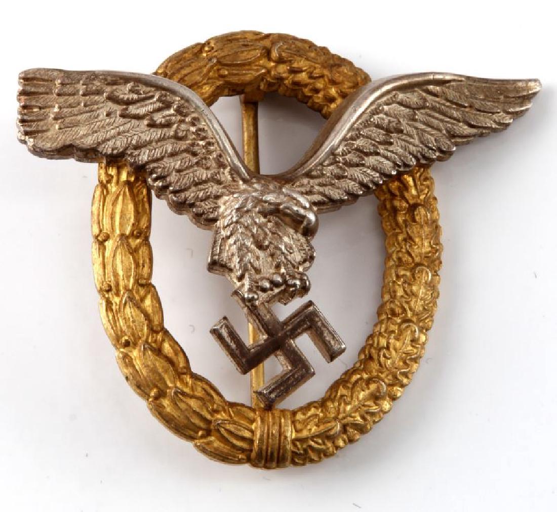 RARE GERMAN WWII LUFTWAFFE PILOT OBSERVER BADGE: German WWII Luftwaffe Pilot Observer qualification badge measures approx. 2 1/2" x 2 1/8" at widest points. Maker marked "C E Junker Berlin SW 68". Has a thin vertical "T-" bar style pin in back with 