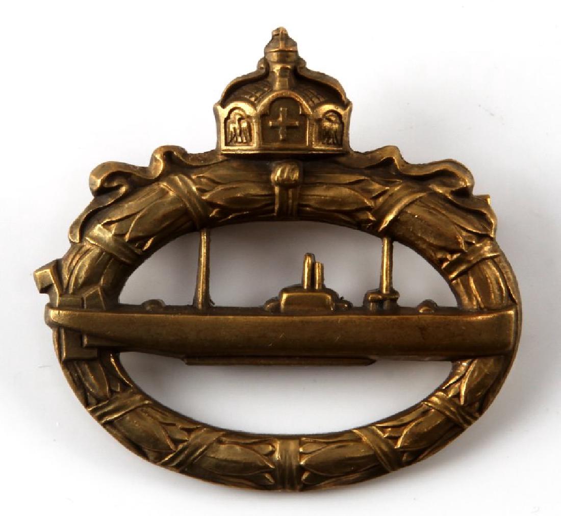 WWI IMPERIAL GERMAN NAVY U BOAT SUBMARINE BADGE: Reverse is maker marked 'Walter Schott fec'. Has a wide horizontal pin back. Sold brass construction. Unauthenticated/Sold 'as is'