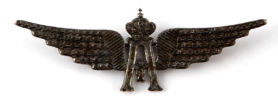 WWI BELGIAN AIR COMPONENT AVIATOR PILOT WINGS: Measures 3 1/8 inches wide by 1 1/16 inches tall. The front shows an "A" with the crown of the King of the Belgians above in the center flanked by a pair of wings. Has a thin horizontal pin back. Stam
