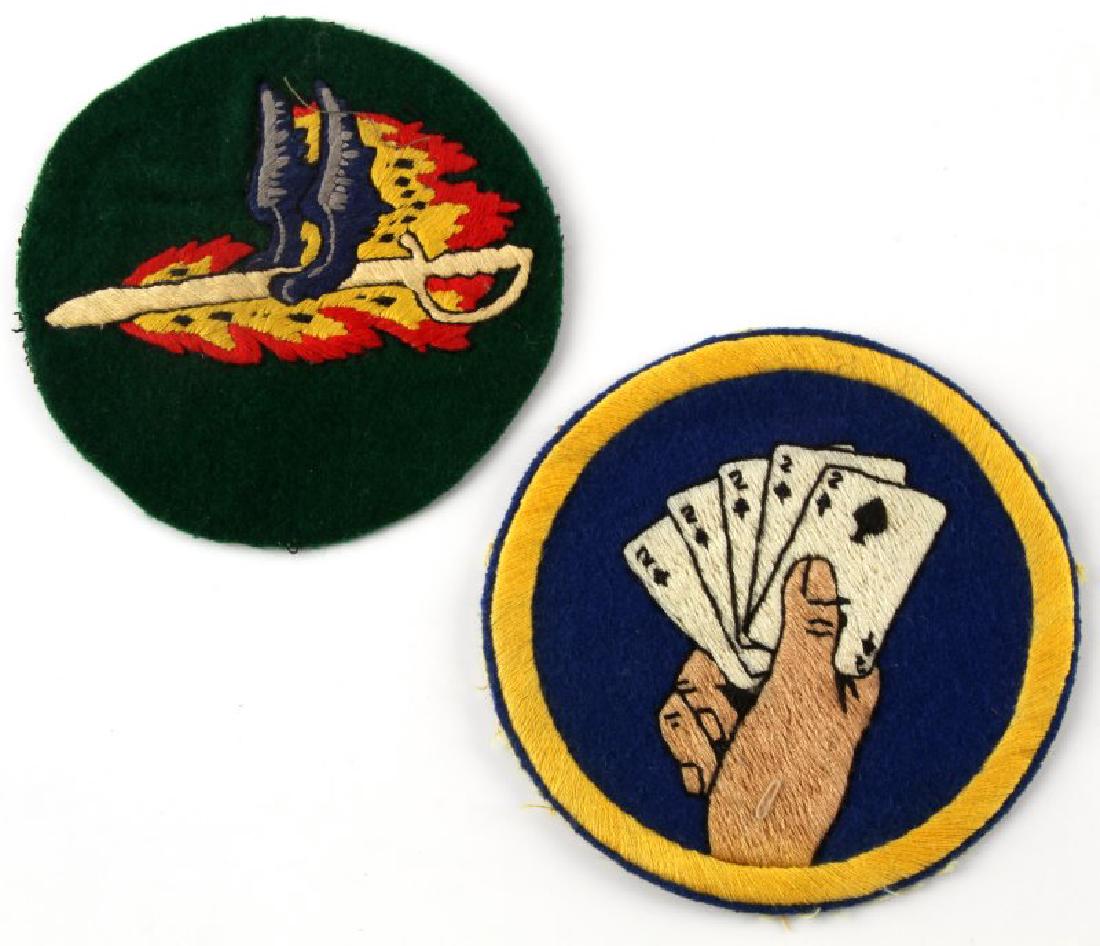 WWII US AIR FORCE FIGHTER FLIGHT JACKET PATCH LOT: Two squadron patches each measure 4 3/4 inches in diameter. Machine and cloth construction on wool theater made.