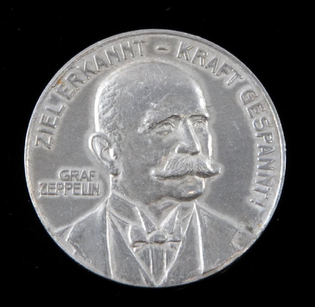 IMPERIAL GERMAN PRE WWI 1908 ZEPPELIN TABLE MEDAL: Imperial German pre WWI 1908 Graf Zeppelin Airship medal. Measures 1 5/16" in diameter. Aluminum construction. Unauthenticated, sold as is.