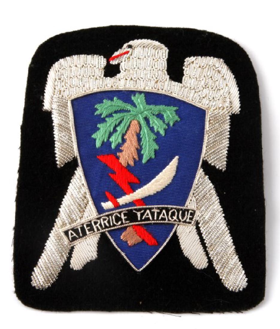 US WWII ARMY AIRBORNE 551ST PARACHUTE INFNT PATCH: US World War II Army Airborne 551st Parachute Infantry pocket patch. Measures 4 1/8" wide by 5 3/16" tall. The front shows eagle with a palm tree. Lightning bolt and machete in the center. It reads 'A