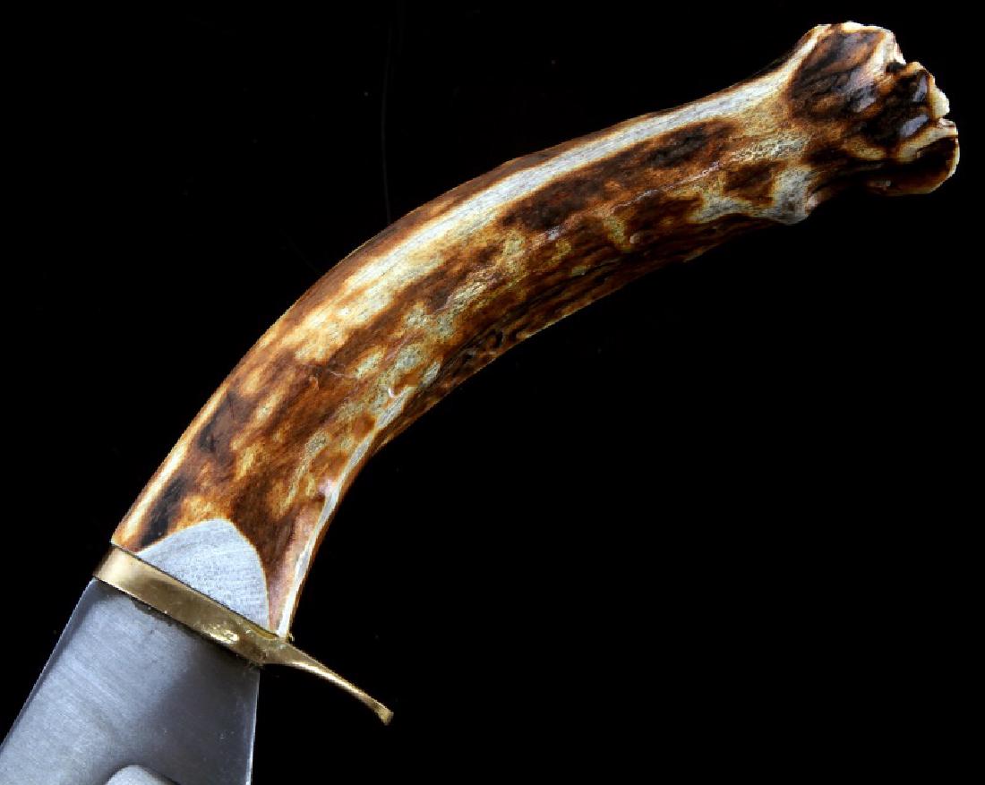 CUSTOM MADE STAG HANDLE SKINING KNIFE: With custom made sheath of buck skin and leather, very nice work, measures 11 inches.