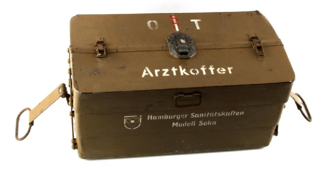 POST WWII GERMAN MILITARY METAL MEDICAL BOX KIT: The box expands and has multiple section. It appears to be mostly complete with only a few tools missing. On the top is painted OIT on one side and Arztkoffer(medical kit). Some items included buy not
