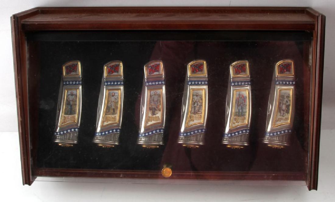 FRANKLIN MINT US CIVIL WAR 6 KNIFE COLLECTION: 6 knives in a wooden display case made by the Franklin Mint as part of a commemorative series. Each knife displays a significant figure from the American Civil War, Union and Confederate. Includes Lt.