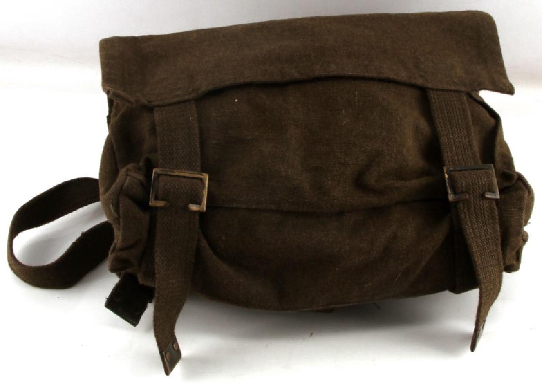 WWII COMMONWEALTH AUSTRALIA FIRST AID MEDICAL PACK: Green canvas pack containing multiple shell dressings and first aid dressings from the Commonwealth of Australia. Also contains several safety pins and a canteen lid. In very good condition. NOL