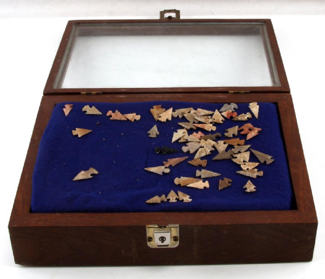CASE FRAME OF 50 BIRD POINT ARROWHEAD COLLECTION: Came to us from a Missouri collection and there is an obsidian point in this lot so uncertain, all believed genuine and are well crafted, average size 1/2 inch to 1 inch. Frame measures 12 by 9 inches