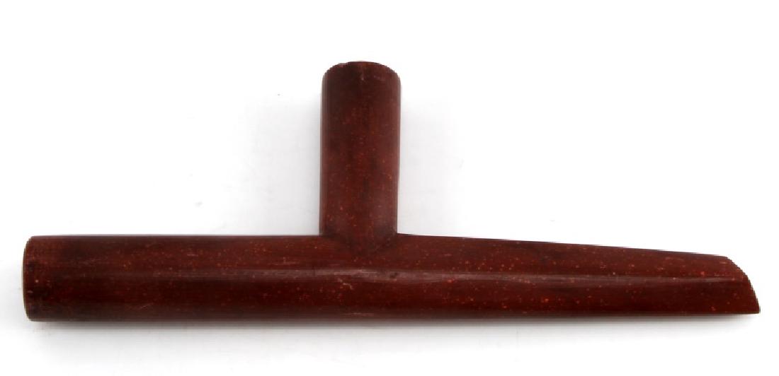 ANTIQUE NATIVE AMERICAN CATLINITE TOBACCO PIPE: Ten inch long Catlinite tobacco pipe carved by Native Americans. In very good condition with some minor scratches and a slight chip near the top of the pipe.