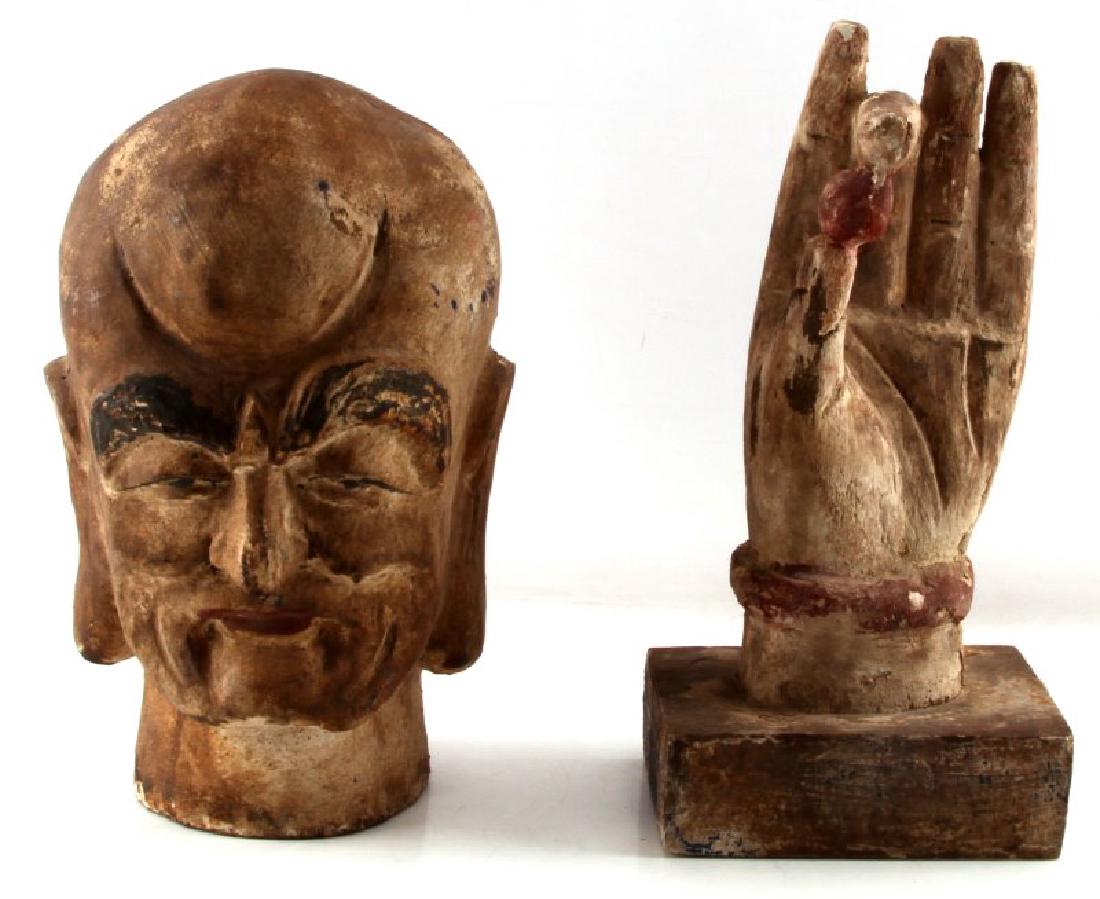 ANTIQUE WOOD PLASTER BUDDHA HEAD & HAND SCUPTURE: Large antique Buddha Head and hand carved from wood, coated in plaster and hand painted. They are in good condition with some chipping, paint loss and discoloration. Hand 14.5x75.5cm, Head 13inches in