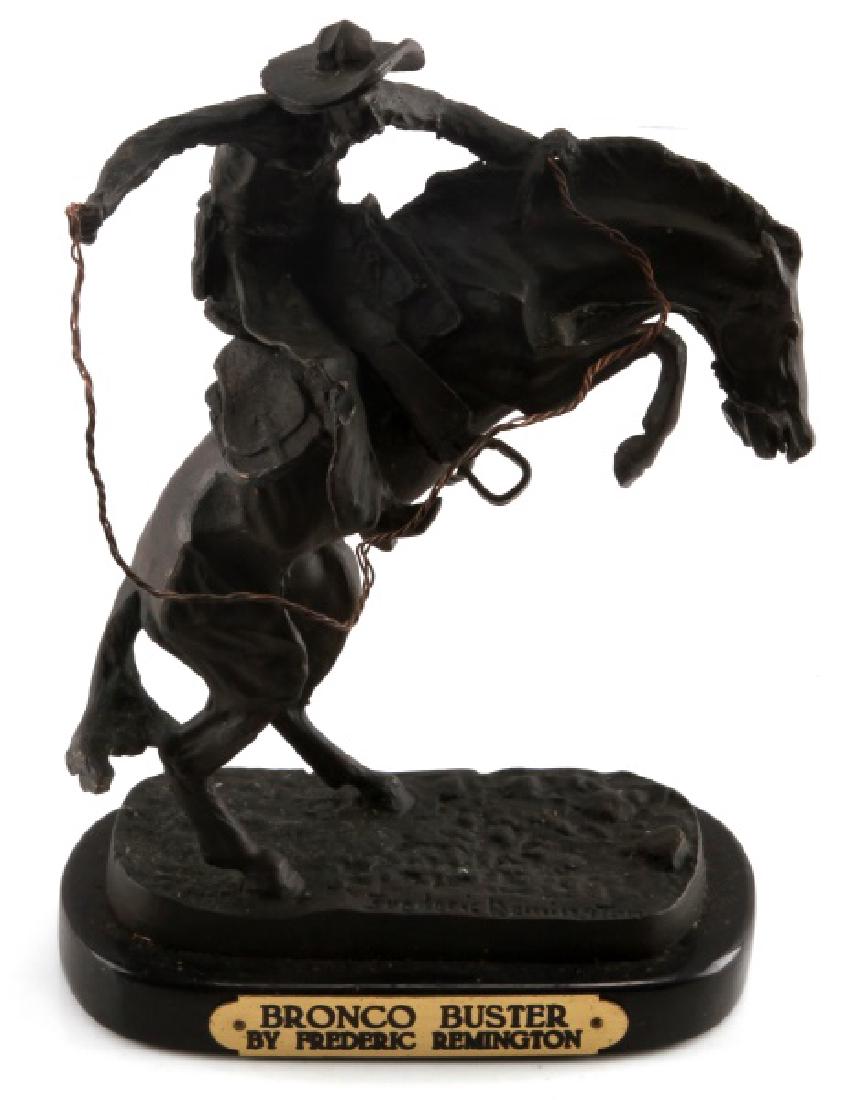 BRONCO BUSTER BY FREDERIC REMINGTON: Bronco Buster by Frederic Remington. Bronze construction. Base inscribed "Frederic Remington". Base measures 6" long and 3 1/2" wide. Height is approx. 9". Overall VG condition, felt base is worn off 