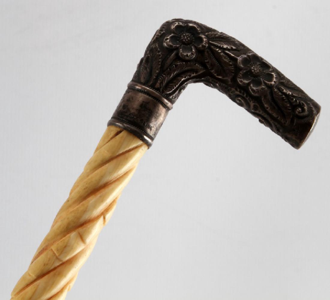 19TH CENTURY WHALE BONE & STERLING LADIES CANE: Whale bone and whale tooth top measuring 3 inches the sterling grip measures 2 inches and is stamped sterling, the overall length is 36 inches. Very good original condition. We will not ship internati