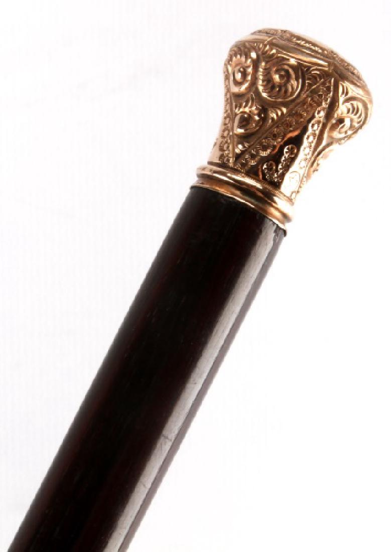 ANTIQUE GOLD TOPPER ELEGANT WALKING STICK CANE: Unmarked but tests for 14 kt gold but is believed and marketed as fill, very fine dark wood shaft and original ferrule tip, overall measures 34.5 inches. Face, Dial, Hands: john