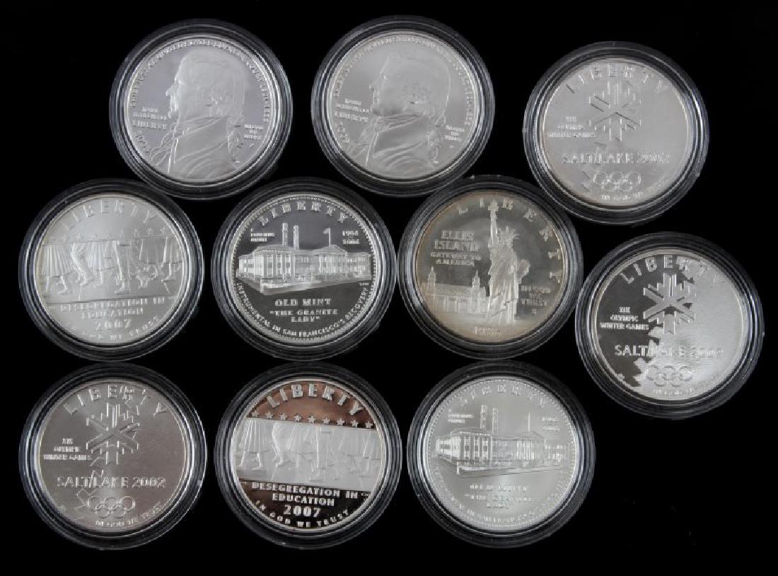 LOT OF PROOF & UNCIRCULATED SILVER COMMEMORATIVES: Lot includes 10 coins: 2005 P Silver John Marshall Commemorative Proof and uncirculated $1 coins, 1906-2006 S Old Mint " The Granite Lady" Silver Proof and uncirculated $1 coins, 2007 P Desegregation