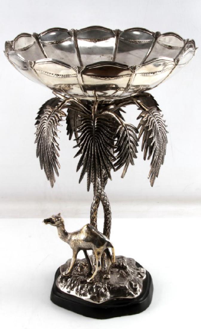 SILVER PLATE CAMEL PALM TREE CENTERPIECE BOWL: India, 1960's, palm tree center post, scalloped bowl, figural camel, composite base, no maker's mark, 19-1/2 inches with 13 inch diameter bowl. Missing liner bowl.