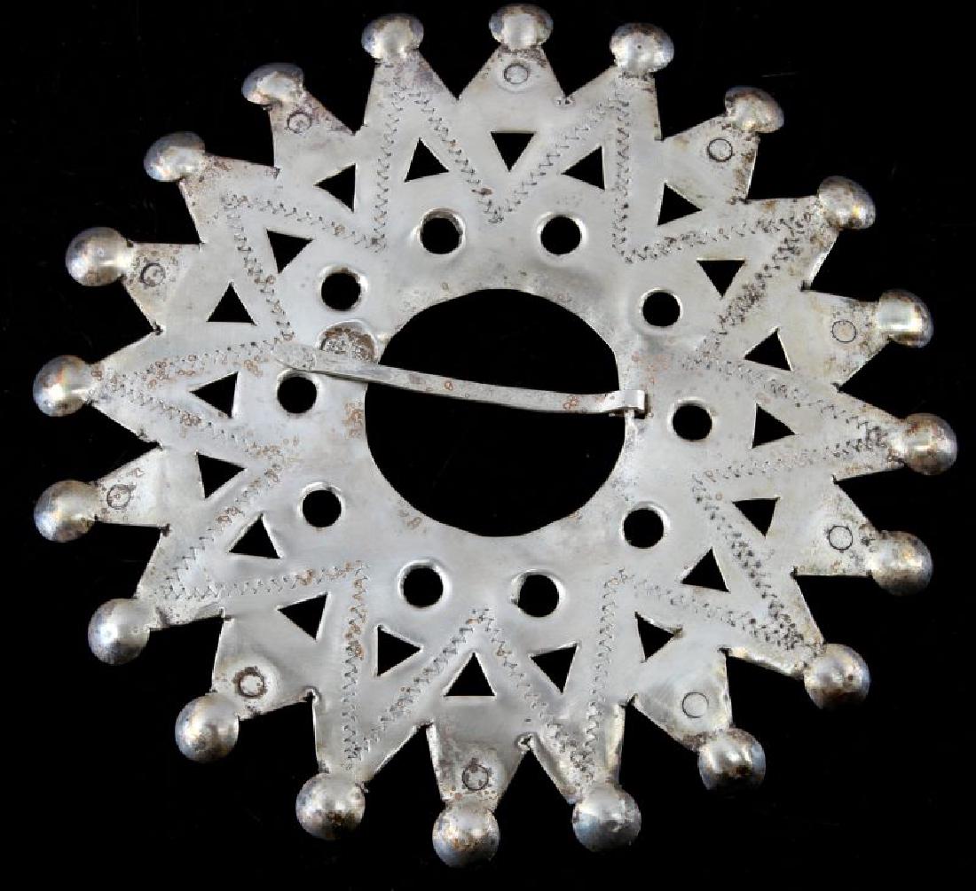 NATIVE AMERICAN ANTIQUE SILVER FUR TRADE BROOCH: Measures 5 1/4 inches in diameter and weighs 38 grams. It is in very good condition. Has no hallmarks but has been tested for silver content. Comes from the Montague collection. This lot has a reserve
